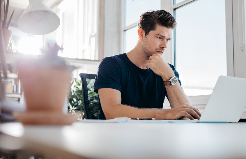 man using laptop